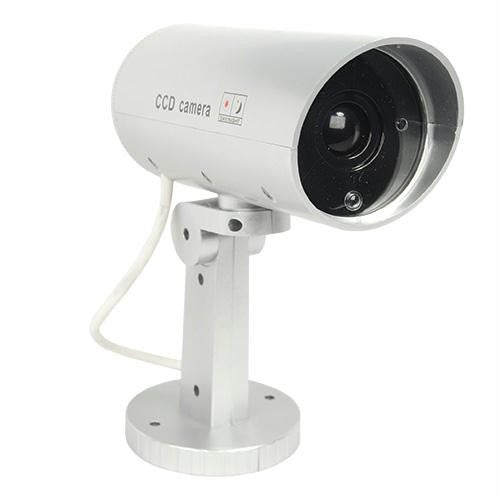 Indoor or outdoor motion activated dummy camera with flashing red LED light.